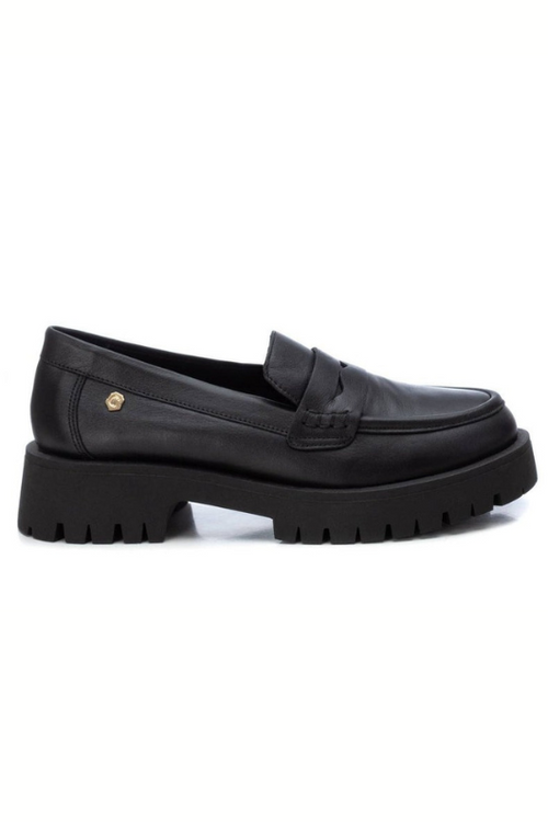 Carmela Chunky Leather Loafer. A pair of black leather moccasin style loafers with non-slip sole.