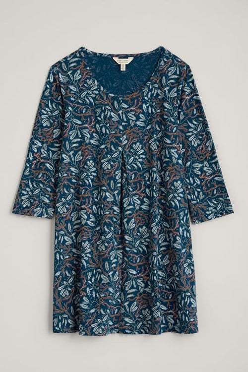 Seasalt Arusha Tunic. An A-line, mid-thigh length tunic with 3/4 length sleeves, scoop neck, and blue nature pattern.