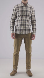 A video of a male model wearing the Barbour Falstone Tailored Long-Sleeved Checked Shirt in the colour Stone.