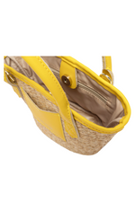 Every Other Straw Rattan Grab Bag. A small raffia bag with yellow faux leather details, top handles, crossbody strap, and fully lined interior with zip pocket.