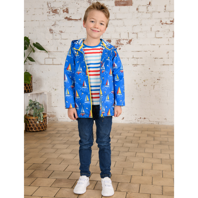 Lighthouse Ethan Jacket. A waterproof boy's jacket with a soft jersey lining, zip-up front, and a cool blue boat design.