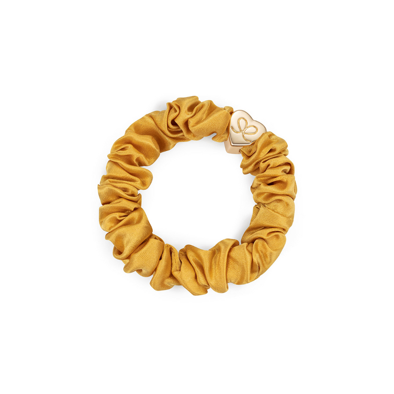 An image of the By Eloise Gold Heart Silk Scrunchie