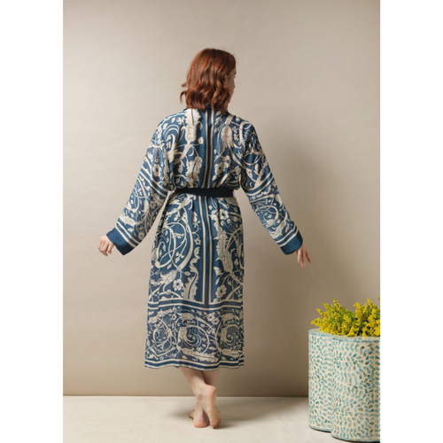 One Hundred Stars Jaipur Blue Gown. A cosy, midi-length dressing gown with a belt tie at the waist, long sleeves, and an all-over intricate design.