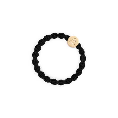 An image of the By Eloise Gold Letter Charm Elastic Hairband