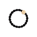 An image of the By Eloise Gold Letter Charm Elastic Hairband