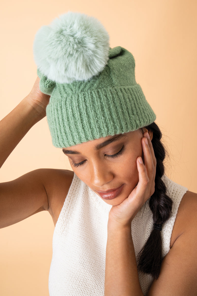 An image of the Powder Ingrid Pom Pom Hat