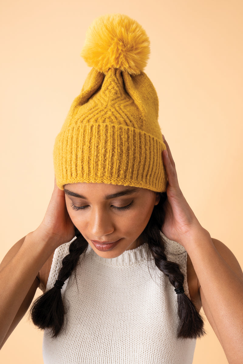 An image of the Powder Ingrid Pom Pom Hat