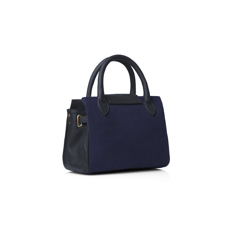 Fairfax & Favor The Mini Windsor. A mini windsor handbag with crossbody strap and tassel details. Suede and leather in the colour Navy.