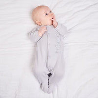 An image of the Dandelion Clothing Stars Sleepsuit